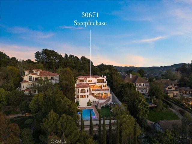 30671 Steeplechase Dr, San Juan Capistrano, CA 92675 - aerial view at dusk of view of pool area