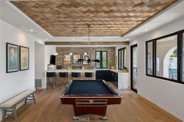 30671 Steeplechase Dr, San Juan Capistrano, CA 92675 - recreation room featuring bar with sink, pool table, light wood-style floors, a raised ceiling, and recessed lighting