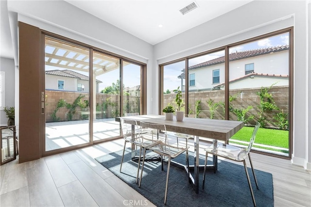 183 Plum Lily, Irvine, CA 92618 - dining space featuring light wood-style flooring and baseboards