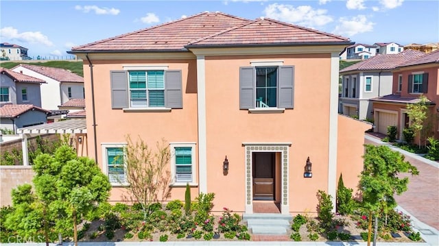 183 Plum Lily, Irvine, CA 92618 - view of front of house featuring stucco siding and a residential view