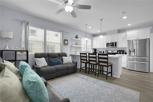 875 Iris Way Unit B, Azusa, CA 91702 - living room featuring a ceiling fan, light wood-style flooring, and recessed lighting