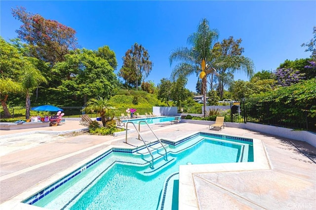 20004 Waverly Glen St Unit 46, Yorba Linda, CA 92886 - community pool with a patio area and view of scattered trees