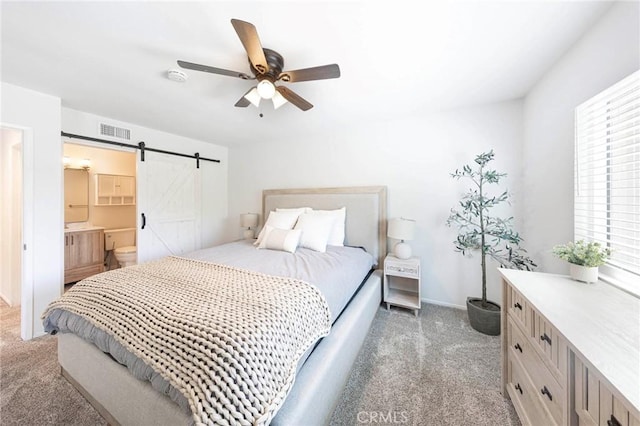 20004 Waverly Glen St Unit 46, Yorba Linda, CA 92886 - bedroom with light colored carpet, a barn door, a ceiling fan, and ensuite bathroom