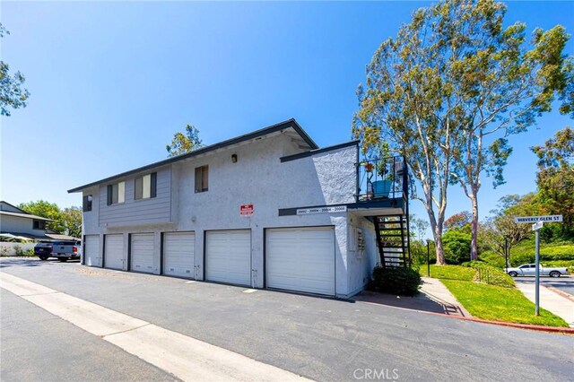 20004 Waverly Glen St Unit 46, Yorba Linda, CA 92886 - view of front of home with stairs and stucco siding