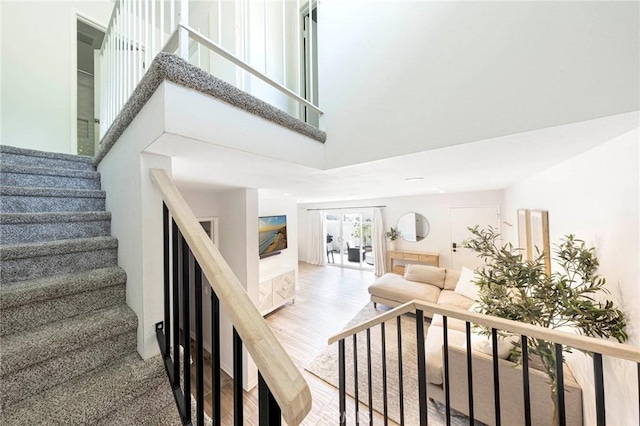 20004 Waverly Glen St Unit 46, Yorba Linda, CA 92886 - stairs with a high ceiling and wood finished floors
