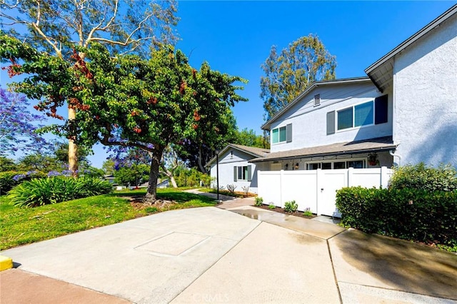 20004 Waverly Glen St Unit 46, Yorba Linda, CA 92886 - view of side of property with a patio and stucco siding