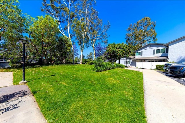 20004 Waverly Glen St Unit 46, Yorba Linda, CA 92886 - view of front of house with a garage, a front lawn, and concrete driveway