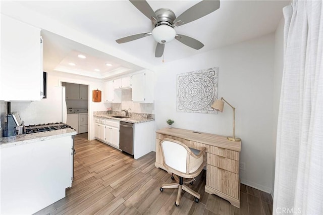 20004 Waverly Glen St Unit 46, Yorba Linda, CA 92886 - kitchen with washing machine and clothes dryer, appliances with stainless steel finishes, light wood finished floors, white cabinetry, and recessed lighting