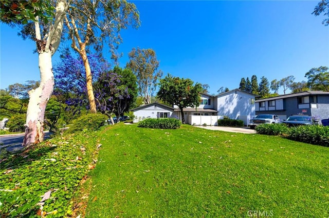20004 Waverly Glen St Unit 46, Yorba Linda, CA 92886 - view of green lawn with driveway
