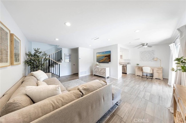20004 Waverly Glen St Unit 46, Yorba Linda, CA 92886 - living area featuring stairway, a ceiling fan, recessed lighting, and light wood finished floors