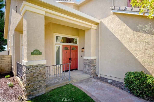 21658 Canyon Heights Cir, Saugus, CA 91390 - view of exterior entry with stone siding and stucco siding
