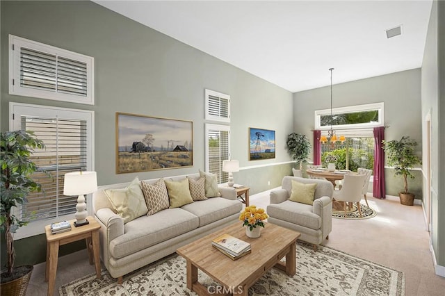 21658 Canyon Heights Cir, Saugus, CA 91390 - living area with carpet flooring and a high ceiling