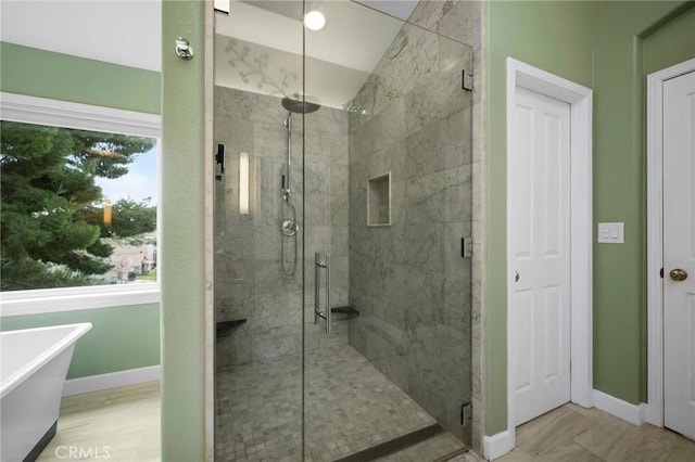 21658 Canyon Heights Cir, Saugus, CA 91390 - bathroom with a marble finish shower and a freestanding tub