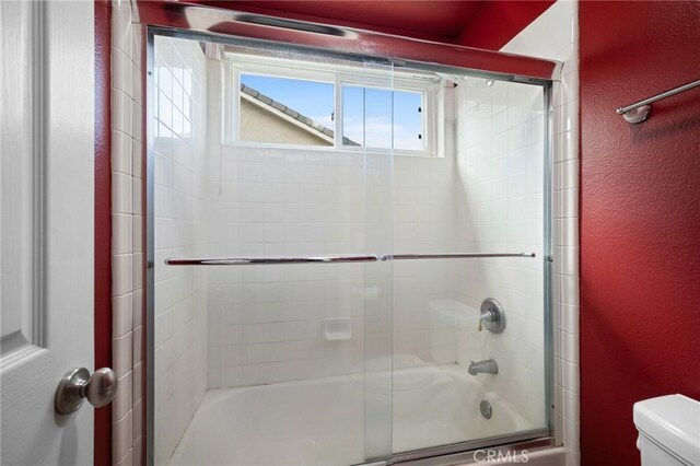 21658 Canyon Heights Cir, Saugus, CA 91390 - full bath with a textured wall and bath / shower combo with glass door