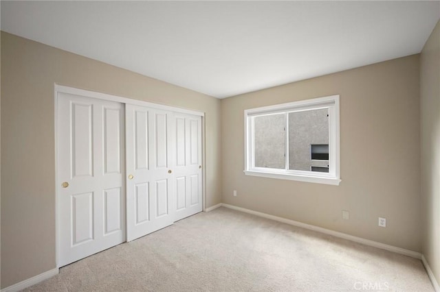 21658 Canyon Heights Cir, Saugus, CA 91390 - unfurnished bedroom featuring carpet and a closet