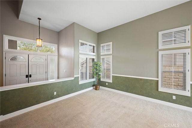 21658 Canyon Heights Cir, Saugus, CA 91390 - entrance foyer with carpet floors and healthy amount of natural light