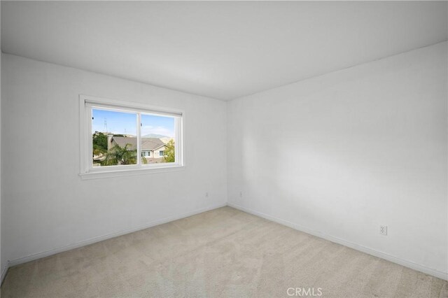 21658 Canyon Heights Cir, Saugus, CA 91390 - carpeted empty room featuring baseboards