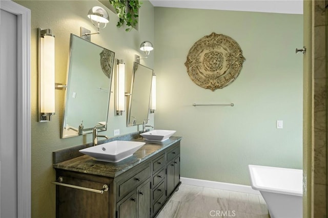 21658 Canyon Heights Cir, Saugus, CA 91390 - full bathroom featuring double vanity, a freestanding tub, and marble finish floors