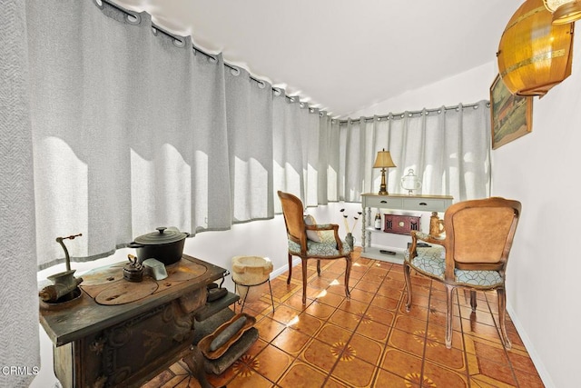 215 Bridewell St, Los Angeles, CA 90042 - sitting room with vaulted ceiling and tile patterned flooring
