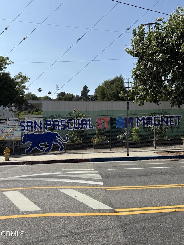 215 Bridewell St, Los Angeles, CA 90042 - view of asphalt street featuring curbs and sidewalks