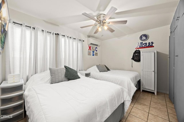 215 Bridewell St, Los Angeles, CA 90042 - bedroom featuring a wall mounted air conditioner, light tile patterned floors, and ceiling fan