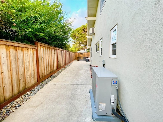1212 Dover Dr, Newport Beach, CA 92660 - view of home's exterior with stucco siding, a fenced backyard, and a patio