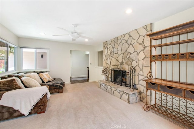 1212 Dover Dr, Newport Beach, CA 92660 - carpeted living area with ceiling fan, a stone fireplace, and recessed lighting