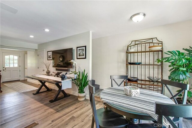 1212 Dover Dr, Newport Beach, CA 92660 - dining room with wood finished floors and recessed lighting