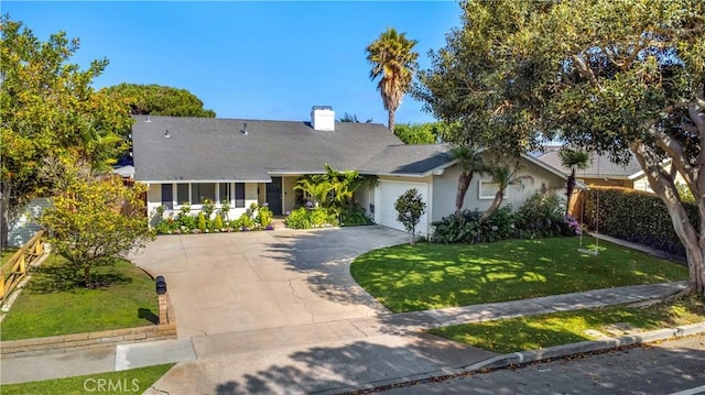 1212 Dover Dr, Newport Beach, CA 92660 - view of front of property featuring concrete driveway, an attached garage, a front yard, a chimney, and stucco siding