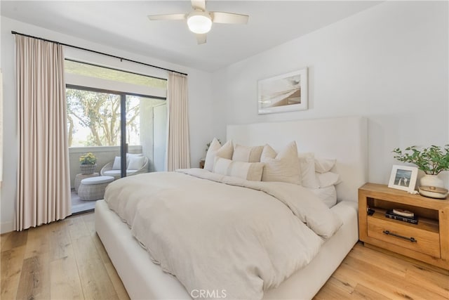 17202 Corbina Ln Unit 103, Huntington Beach, CA 92649 - bedroom with access to outside, light wood-style flooring, and ceiling fan