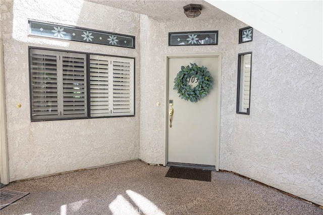 17202 Corbina Ln Unit 103, Huntington Beach, CA 92649 - property entrance featuring stucco siding