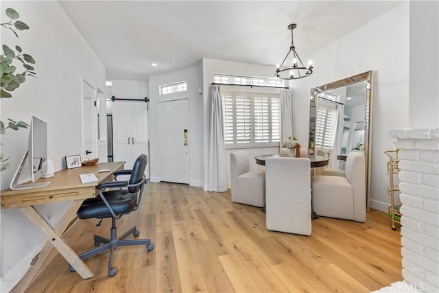 17202 Corbina Ln Unit 103, Huntington Beach, CA 92649 - office featuring light wood-style flooring and a chandelier