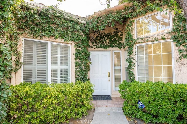 26604 Marigold Ct, Calabasas, CA 91302 - view of exterior entry featuring stucco siding