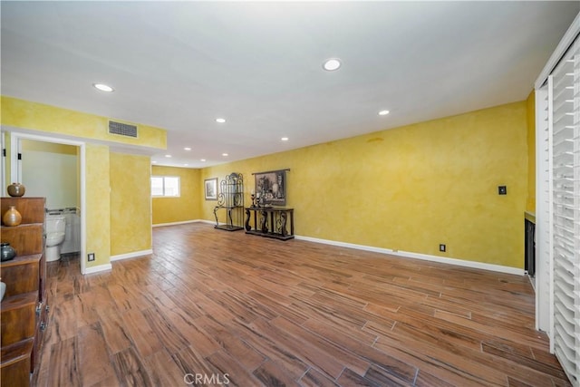 14947 Dickens St Unit 3, Sherman Oaks, CA 91403 - spare room featuring wood finished floors, a fireplace, and recessed lighting