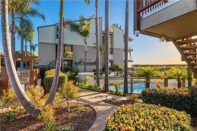 335 W I St, Encinitas, CA 92024 - view of building exterior with a community pool