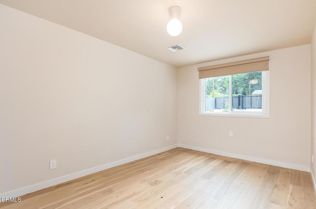 987 Bell St, Pasadena, CA 91104 - empty room featuring baseboards and light wood-style floors