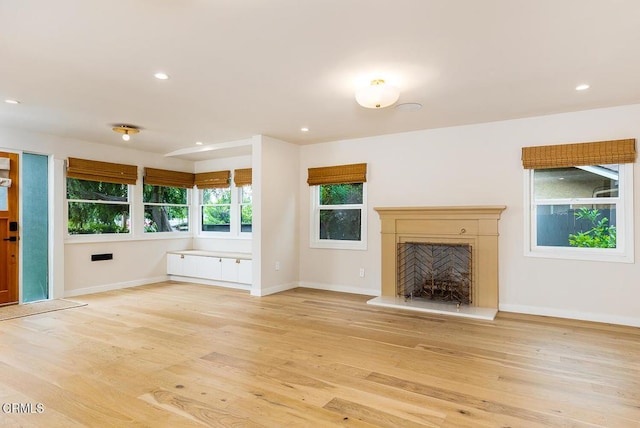 987 Bell St, Pasadena, CA 91104 - unfurnished living room featuring light wood-style flooring, recessed lighting, and a high end fireplace