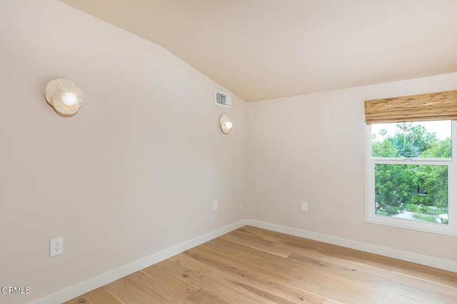 987 Bell St, Pasadena, CA 91104 - unfurnished room with lofted ceiling and light wood-style floors