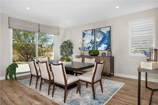 13902 Hidden Pines Ct, Victorville, CA 92392 - dining space featuring wood finished floors and recessed lighting