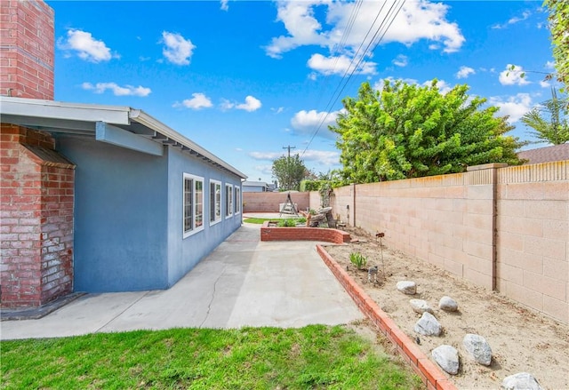 6116 Choctaw Dr, Westminster, CA 92683 - fenced backyard featuring a patio