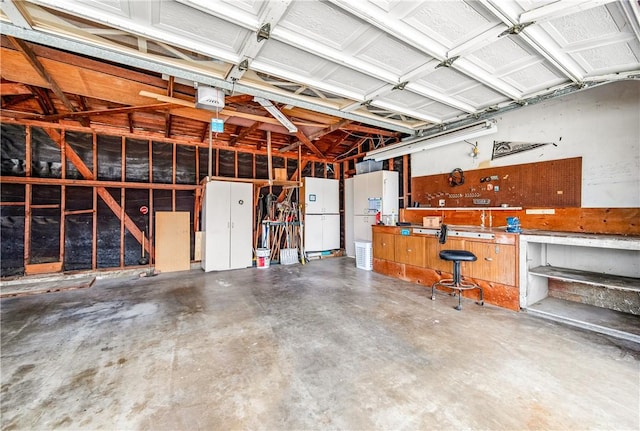 6116 Choctaw Dr, Westminster, CA 92683 - garage with a workshop area and freestanding refrigerator