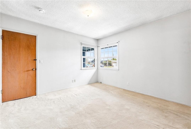 6116 Choctaw Dr, Westminster, CA 92683 - spare room with carpet flooring and a textured ceiling