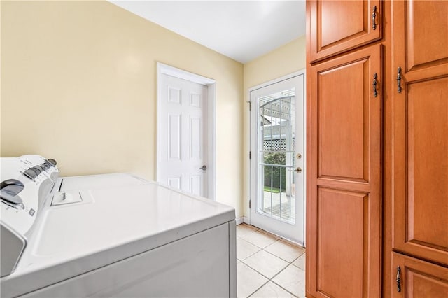 6116 Choctaw Dr, Westminster, CA 92683 - laundry room with washer and dryer, cabinet space, and light tile patterned floors