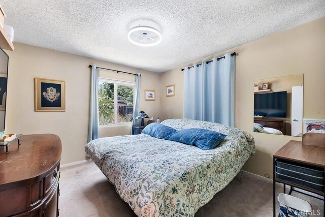 19147 Ingomar St, Reseda, CA 91335 - carpeted bedroom with a textured ceiling and baseboards