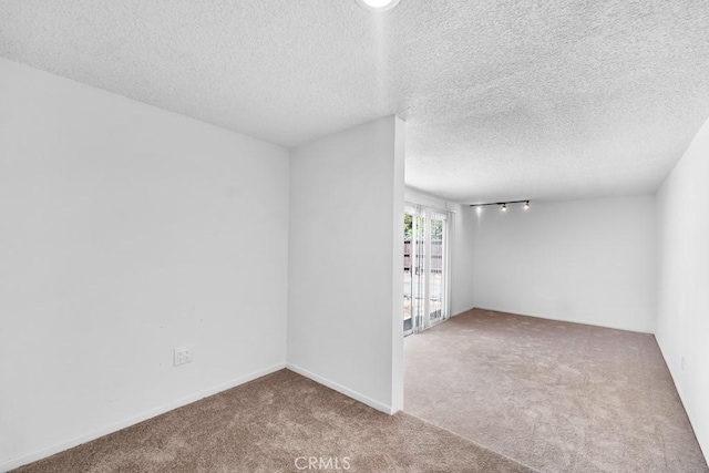 19147 Ingomar St, Reseda, CA 91335 - spare room featuring carpet flooring and a textured ceiling