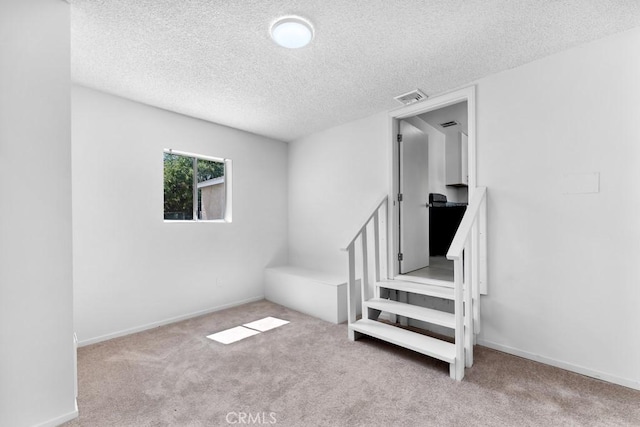 19147 Ingomar St, Reseda, CA 91335 - carpeted spare room with a textured ceiling and baseboards