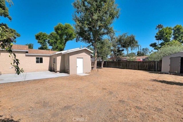 19147 Ingomar St, Reseda, CA 91335 - fenced backyard with a storage unit and a patio