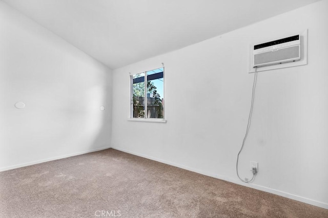 19147 Ingomar St, Reseda, CA 91335 - carpeted empty room featuring lofted ceiling and an AC wall unit