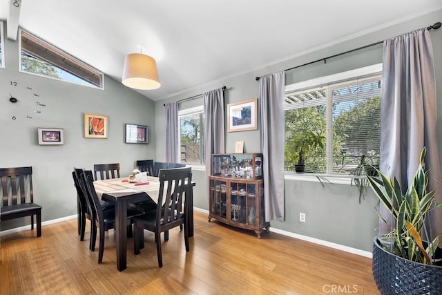 19147 Ingomar St, Reseda, CA 91335 - dining area featuring vaulted ceiling and light wood finished floors