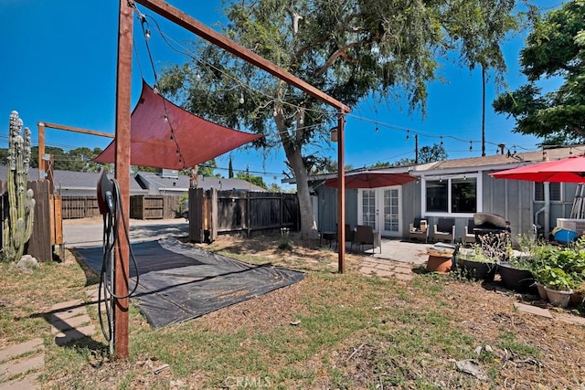 19147 Ingomar St, Reseda, CA 91335 - fenced backyard with french doors and a patio